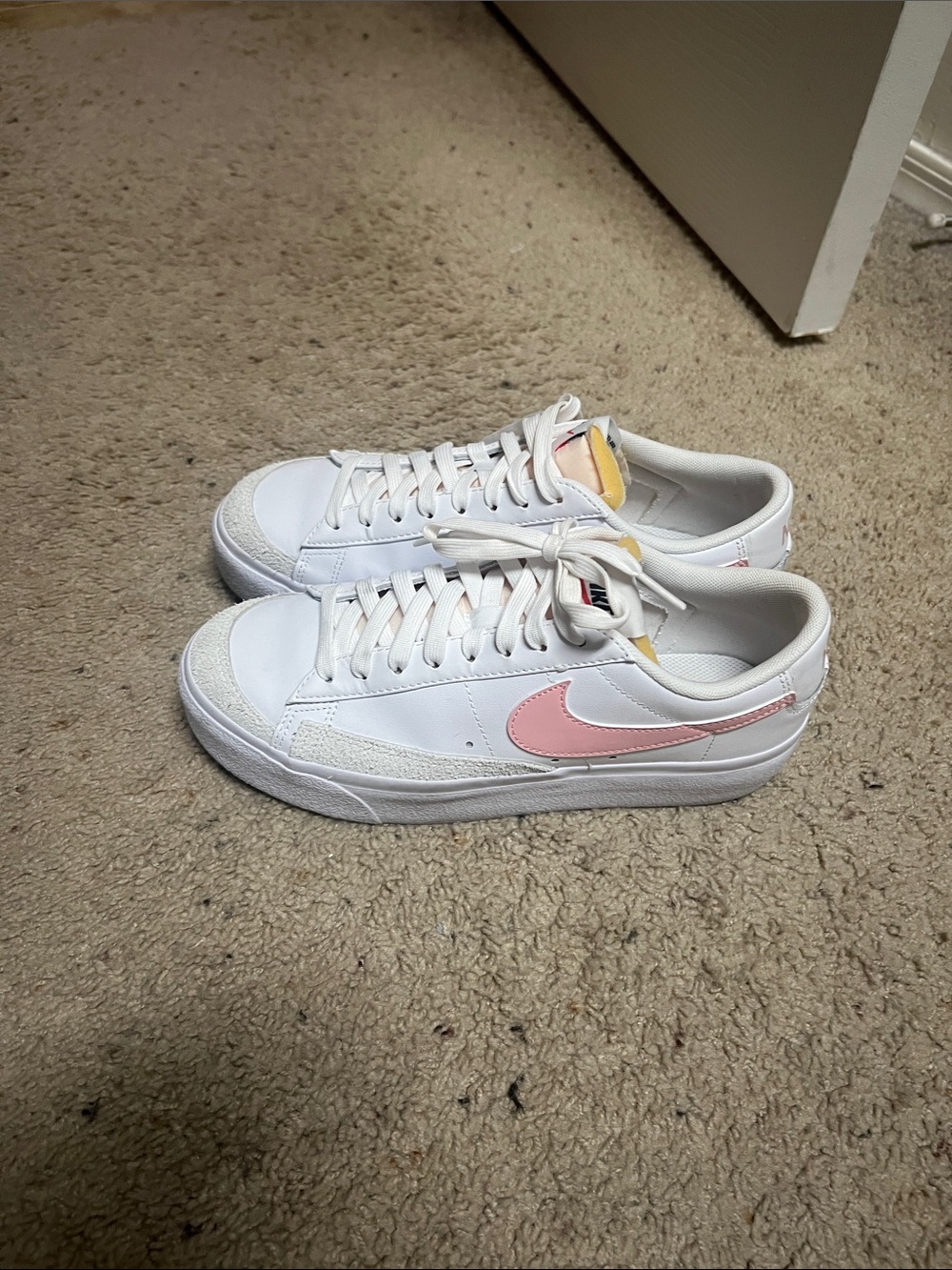 Nike Women’s White Sneakers with Pink Swoosh